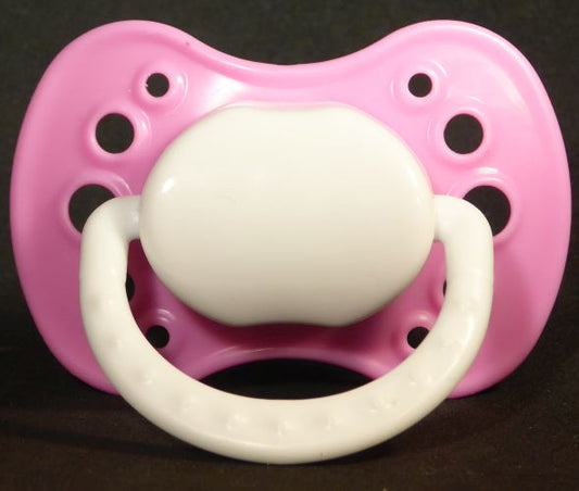 pink & white dummy with Nuk teat