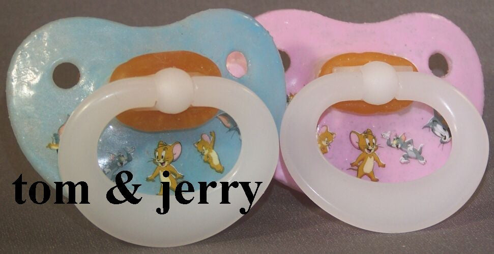 NUK Pacifier decorated with Tom and Jerry.